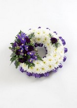 Wreath Based with flower cluster.